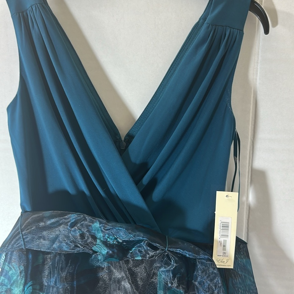 Mixed Media Sleeveless A-Line Gown
Eliza J - Picture 8 of 11
